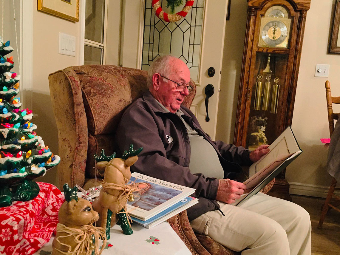 Helmut Bambl Reading to grandchildren Christmas